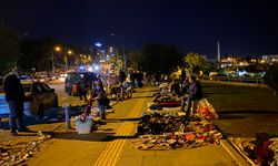 Konak’ın enternasyonal bitpazarı… Suriyeli satıcı, Afrikalı müşteri!