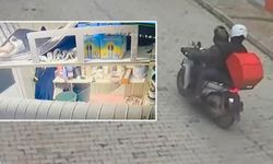 Susturucu takılı silahla evi bastılar!