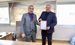 Menderes Belediyesi Ziraat Bankası’na ait iş yerinin tapusu aldı