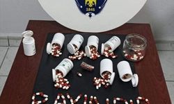 İzmir'de ruhsatsız tabanca ve uyuşturucu operasyonu