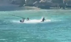 Denizin ortasında sopalı kavga