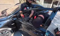 Pusetteki bebekle uyuşturucu kuryeliği yapan kadın yakalandı