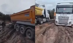 Sağanak sonrası yol bataklığa döndü: Kamyonlar mahsur kaldı!