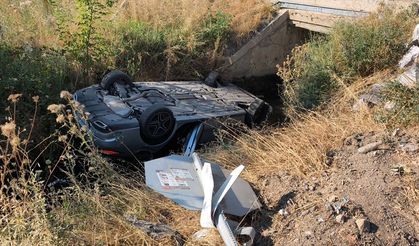 Kütahya'da sulama kanalına devrilen otomobilin sürücüsü yaralandı