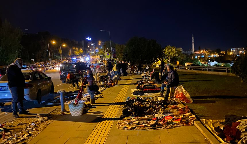 Konak’ın enternasyonal bitpazarı… Suriyeli satıcı, Afrikalı müşteri!