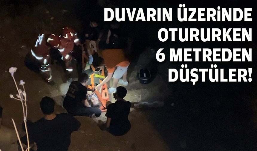 Duvarın üzerinde otururken 6 metreden düştüler!
